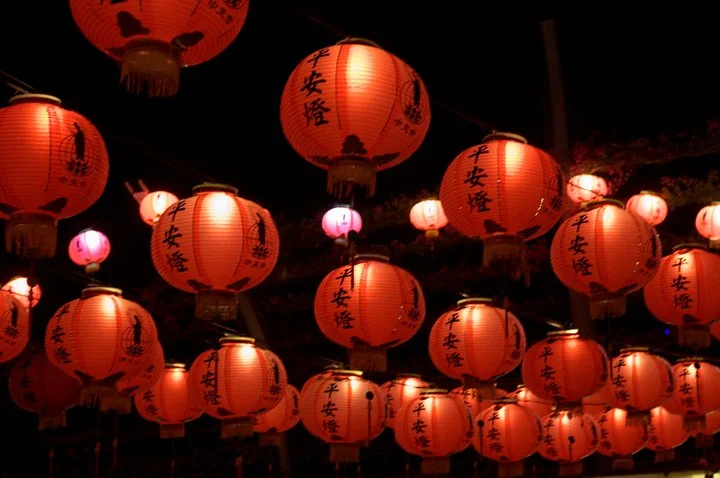 Red paper lanterns at night are one of the most reliable subjects in festival photography. The light comes from inside.