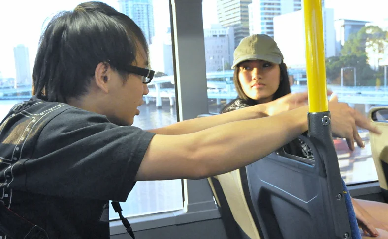 The commute to a shoot is part of the shoot. The bus window, the light through glass, a conversation with a camera between you — all of it is practice.